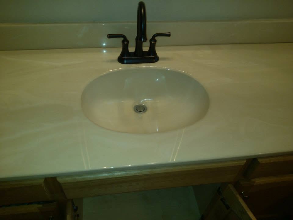 White bathroom sink and new faucet